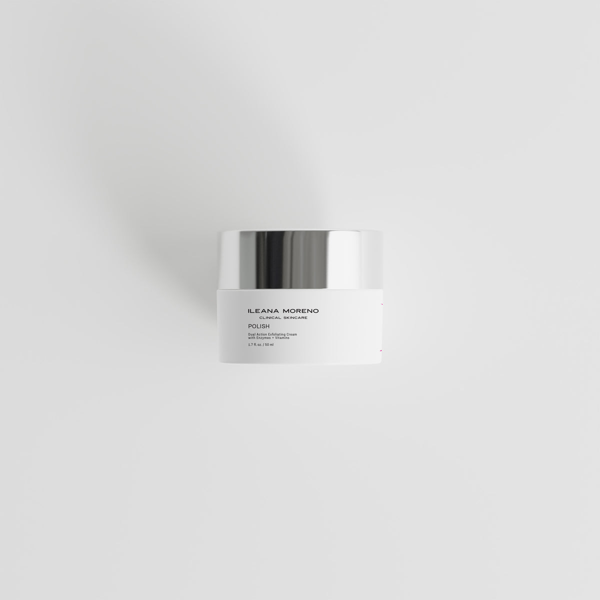 Skincare jar with 'Ileana Moreno' branding on a light gray background